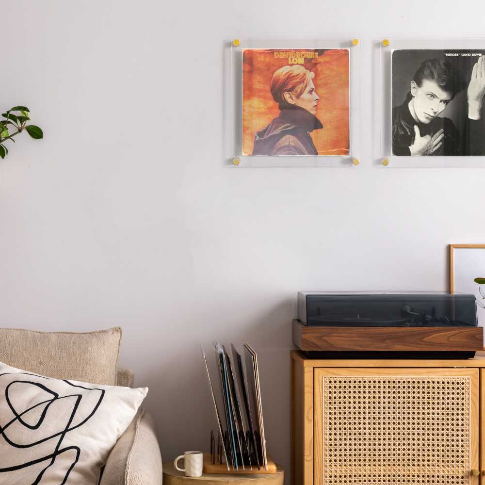 David Bowie albums being displayed in a plexiframe